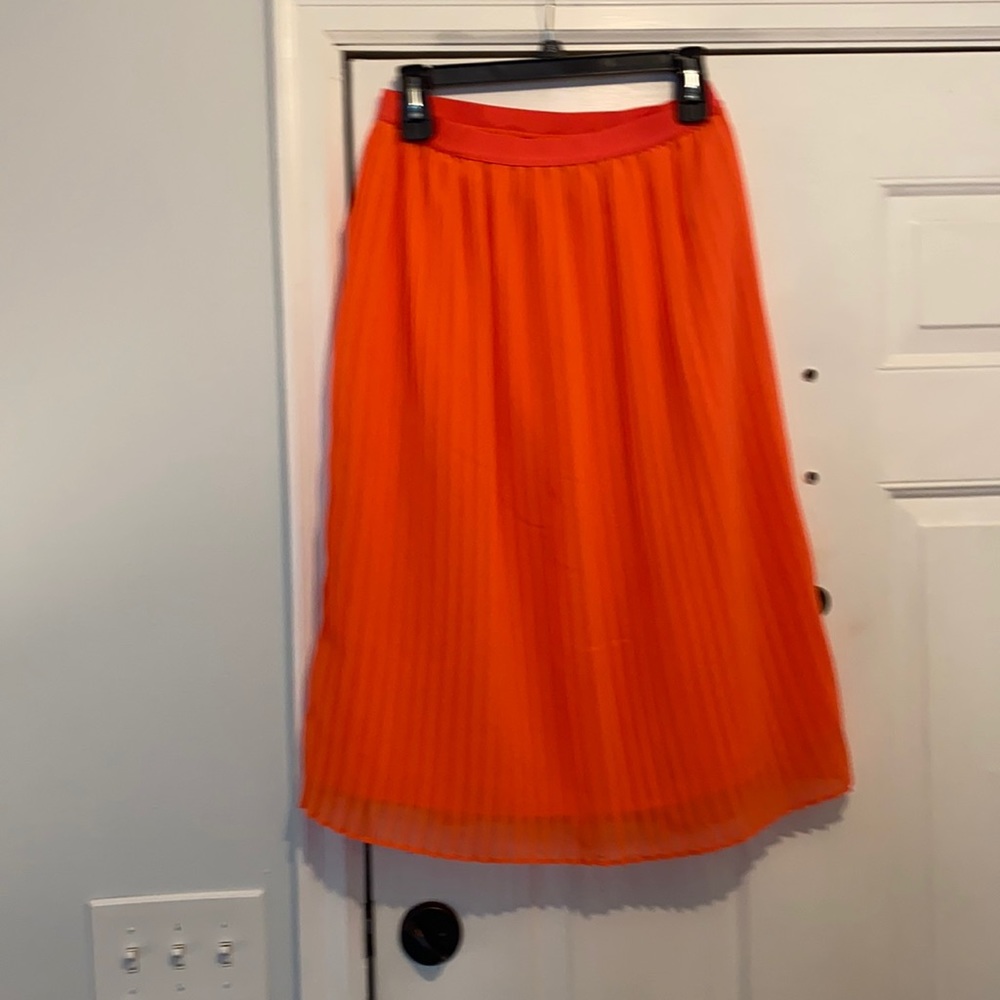 Bright orange midi skirt